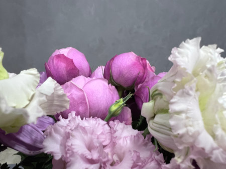 Beautiful bouquet of flowers: white, pink and burgundy chrysanthemums, roses, eustomsの写真素材