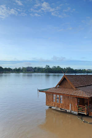 Riverside houseboat, Thailandの写真素材