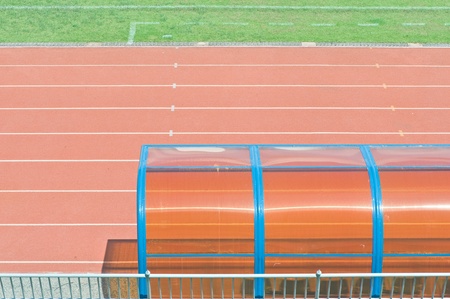 Coach and reserved benches in soccer stadiumの写真素材