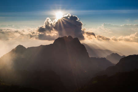 beam of light on the mountain peakの写真素材