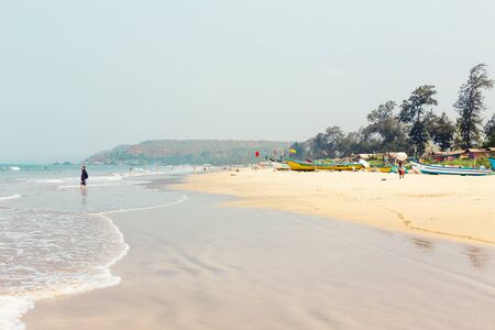 Sandy tropical beach, Arabian Sea, Indian Ocean. Resort Goa, India, beach Arambol. Lifestyle Travel, outdoor activities in nature.のeditorial素材