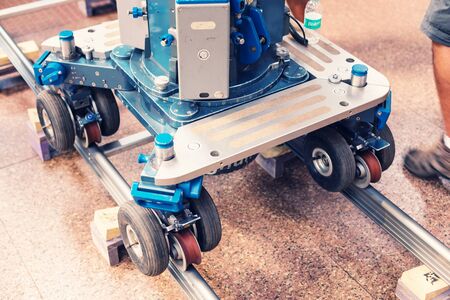 Production plant trolleys for professional camera equipment and video shooting in a large studio. Indian cinema and advertising shooting in Vasco da Gama, Goa.の写真素材