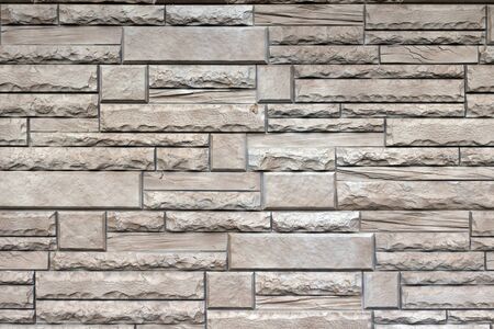 Pattern of grey and rough sandstone wall texture and background of modern style design decorative...