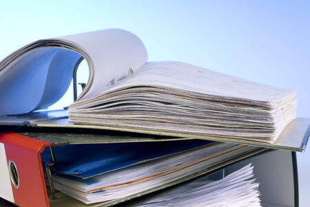 Open file folder on a stack of folders