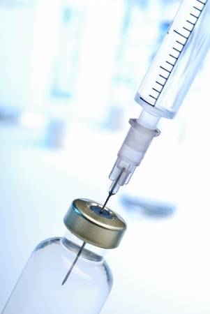 Close up of syringe and groutの写真素材