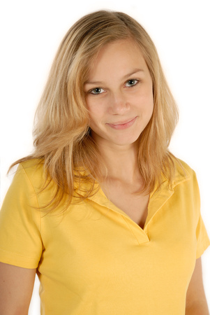Beautiful blonde girl looks shy の写真素材