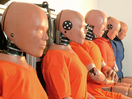 Five test dummies in a rowの写真素材