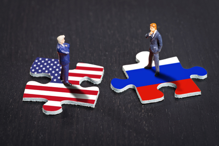 Puzzle pieces with the flags of the USA and Russiaの写真素材