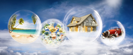 Soap bubbles with beach scene, banknotes, house and car