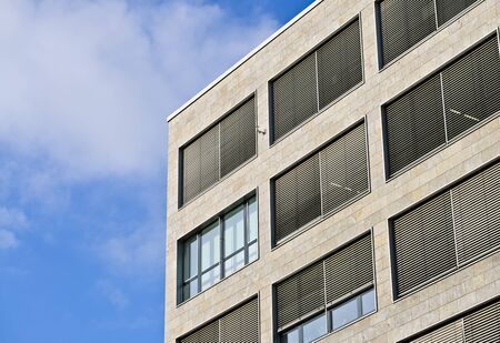 Office building with closed blinds in detail