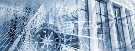 Compass, gears, diagrams and facades of office buildings as a symbol for business and financial marketsの写真素材