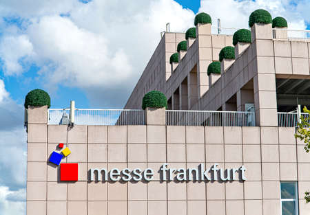 The logo of Messe Frankfurt on a building at the exhibition centerのeditorial素材