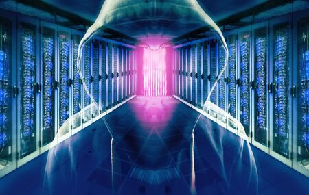Rows of servers and the silhouette of a hacker