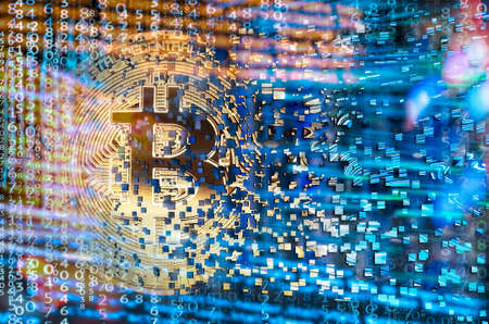Bitcoin in front of an abstract background dissolves into pixelsの写真素材
