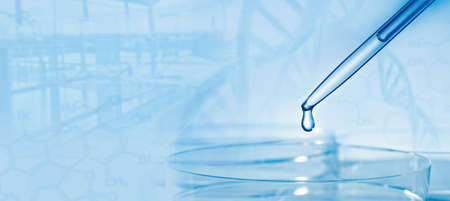 Pipette and Petri dish with DNA and formulas with abstract science backgroundの写真素材