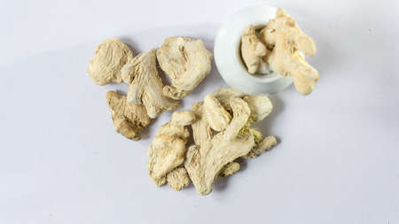 Dry ginger root isolated on white background