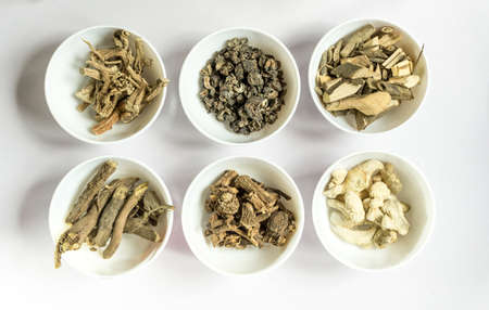 Ayurvedic Herbs 1.Sarana 2.Amla fruits-dried/Phyllanthus emblica 3.Pawatta(Pavetta indica)/Papidi 4.Heap of liquorice sticks/Glycyrrhiza  5.Indian Sarsaparilla Root/ Hemidesmus indicus 6.Dry ginger rootの写真素材