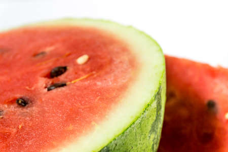 Water melon with slices isolated on white background.の写真素材