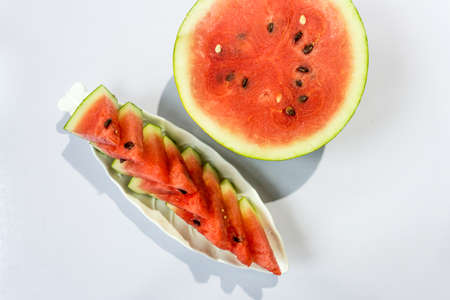 Watermelon with slices isolated on white background.の写真素材