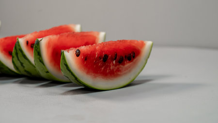 Sliced watermelon on a white background. Selective focus.