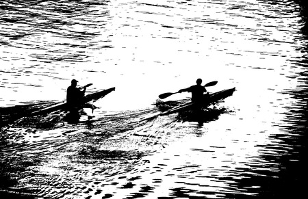 Evening training of oarsmen on kayaks.の写真素材