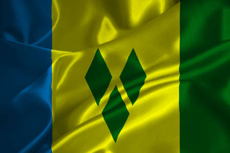 St Vincent and Grenadines flag on satin texture.の写真素材