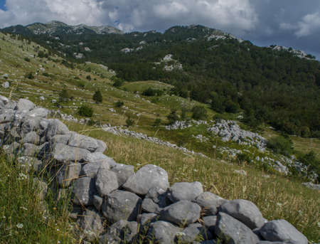 Stoned wall on hill
