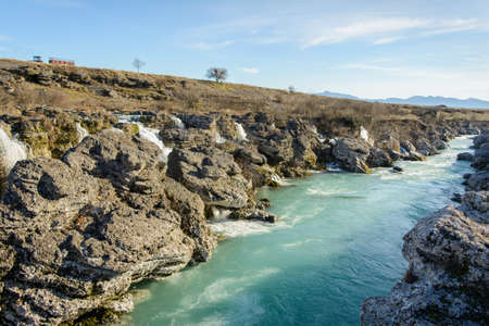 Beautiful blue river surrounded by rock formationの写真素材