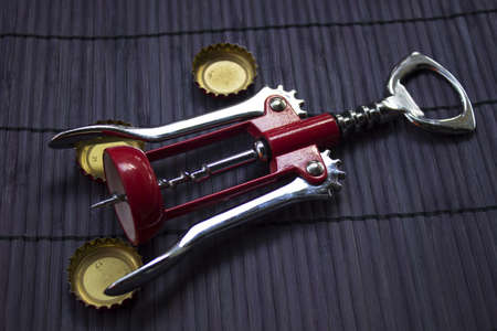 cap drink opener  on wicker matの写真素材