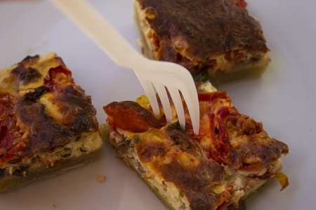 pizza cut and forkの写真素材