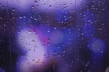 Rain drops on window Bokehの写真素材