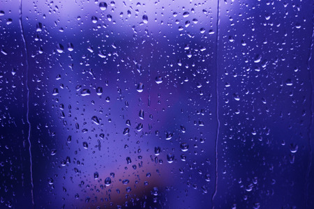 Rain drops on window Bokehの写真素材