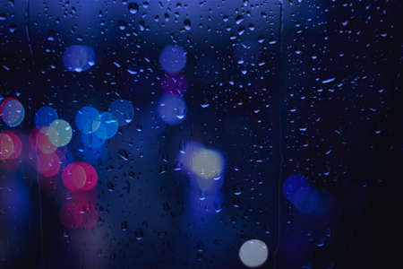 Rain drops on window Bokehの写真素材