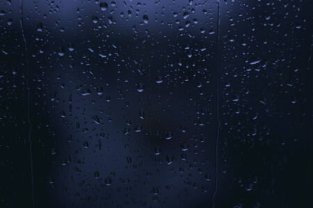 Rain drops on window Bokehの写真素材
