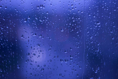 Rain drops on window Bokehの写真素材