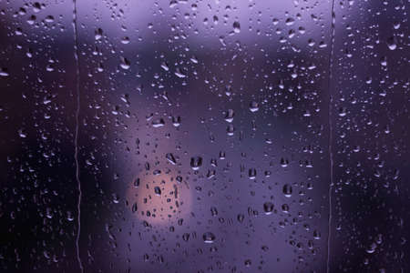 Rain drops on window Bokehの写真素材