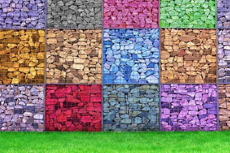Colorful Abstract Stone Wall perfomance art on grassの写真素材
