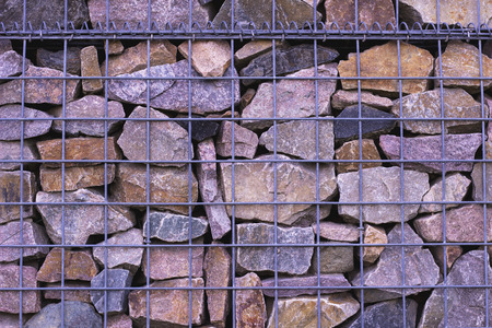 Abstract Stone Wall perfomance art on grassの写真素材