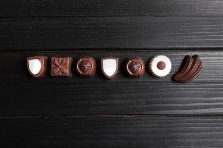 chocolate candies in the form of shells, desertの写真素材