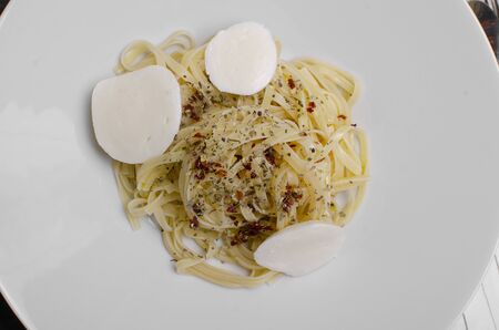 Linguine pasta in tomato sauce on a plate