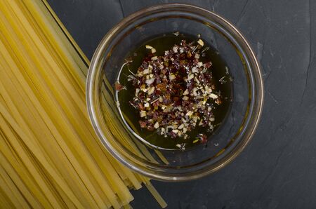 Linguine pasta in tomato sauce on a plateの写真素材