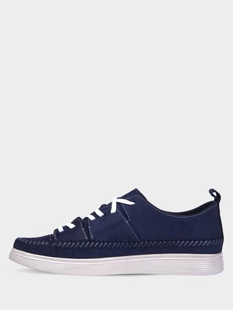 Men's summer suede blue sneakers with white soles. Men's sports shoes. Sport style. Isolated on a white background.の写真素材