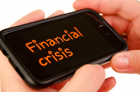 Financial crisis on mobile phone isolatedの写真素材