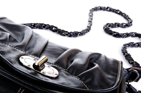 Black purse closeup isolated on white