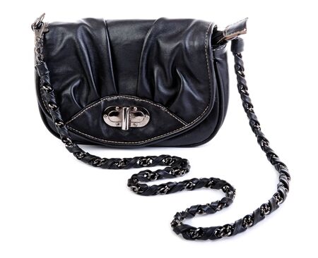 Black female handbag isolated on whiteの写真素材