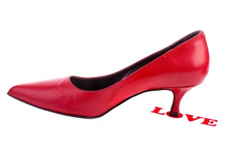 Red shoe with label love isolated on whiteの写真素材