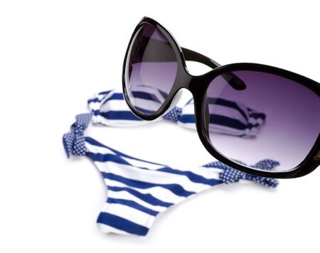 Sunglasses and bikini isolated on whiteの写真素材