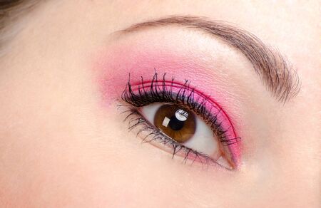 Hazel eye with pink make-upの写真素材