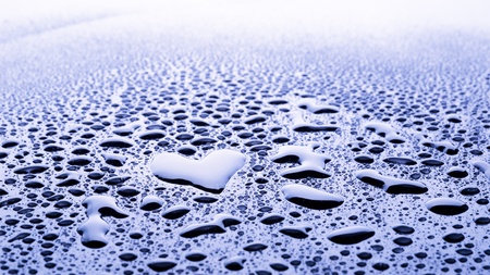 heart between water dropletsの写真素材
