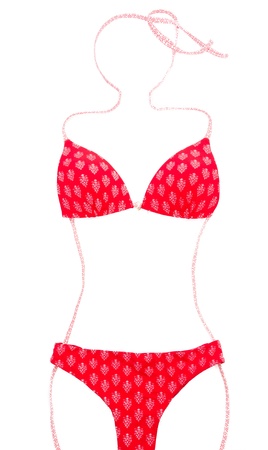 Red bikini with woman shape isolated on whiteの写真素材